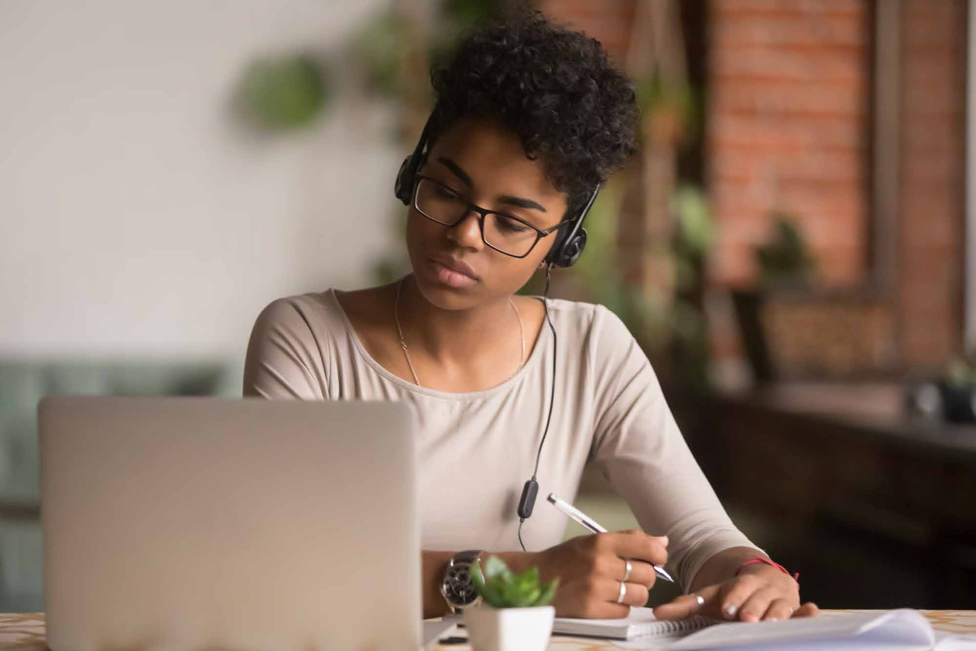 Girl-on-computer-w-headphones2